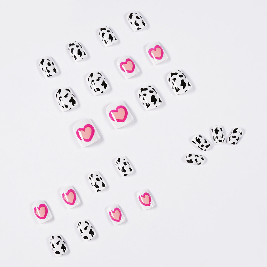 Creative nail art with heart and animal pattern motif Stornfield