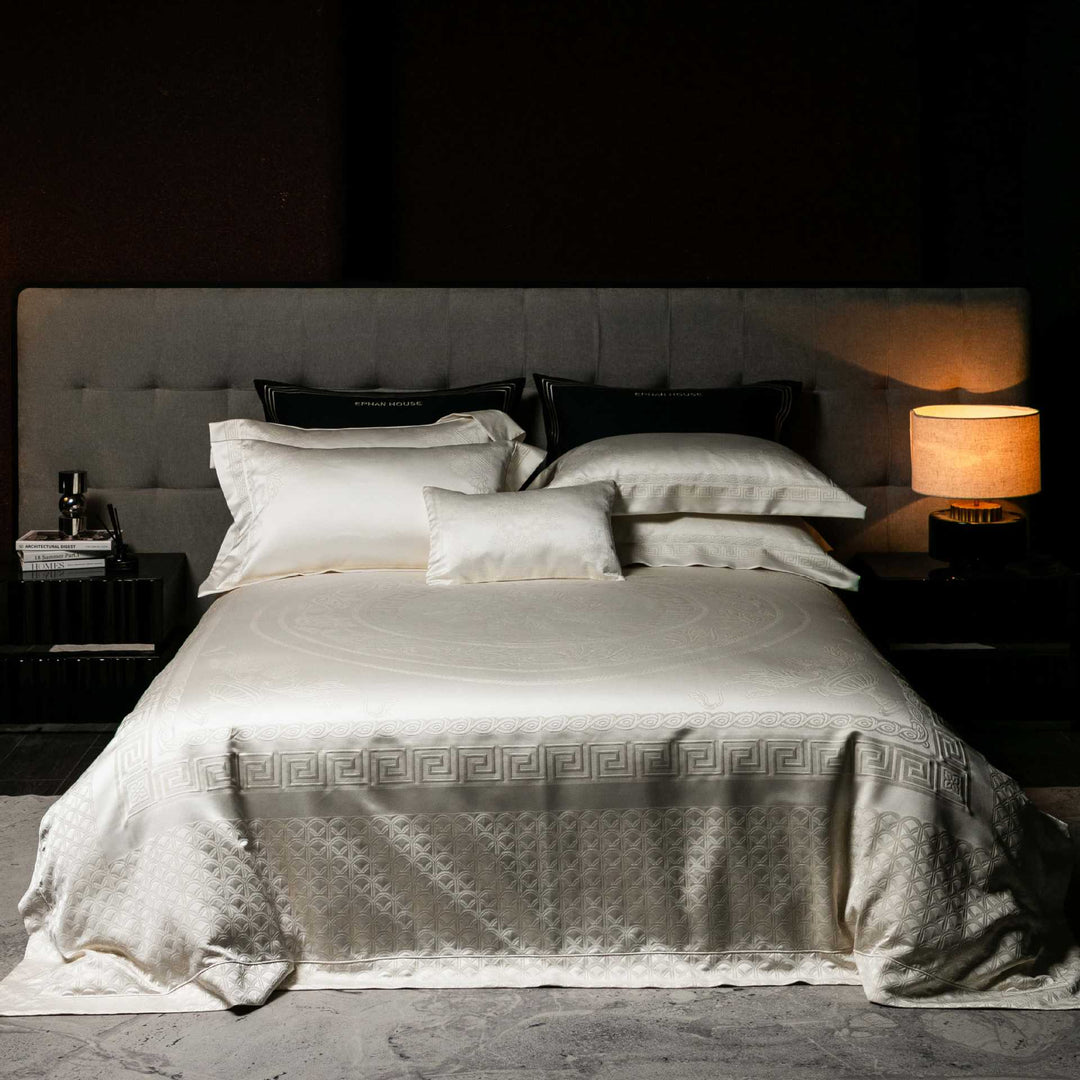 Jacquard bedding set made of cotton satin with embossed medallion and pillow ruffle