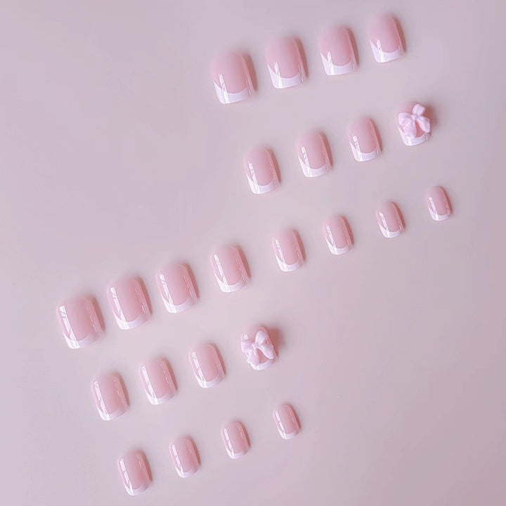 Acrylic Nail Set with Elegant Tips and 3D Bow Decorations Stornfield