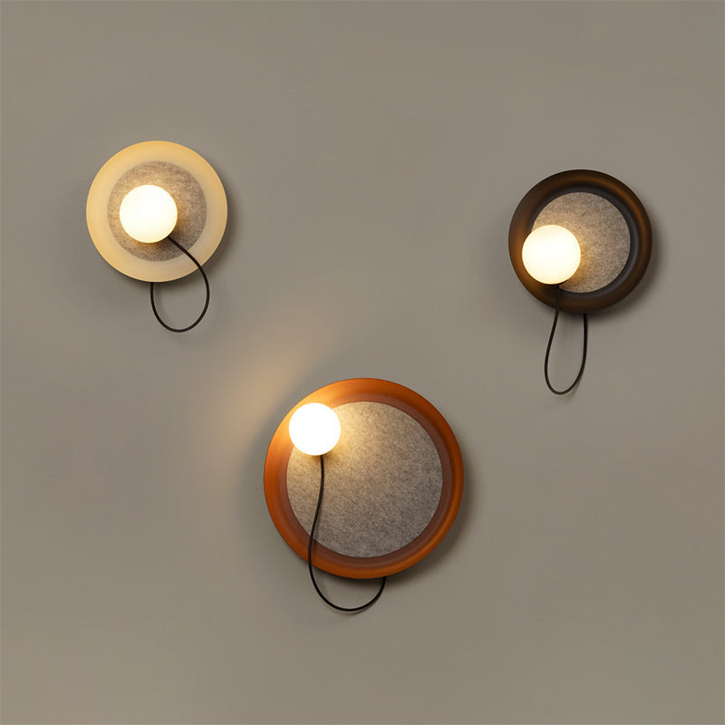 Modern Wall Sconce with Fabric Backdrop and Soft Glow