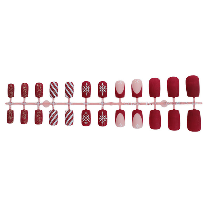 Artificial nail set with festive holiday motifs and sparkling accents Stornfield