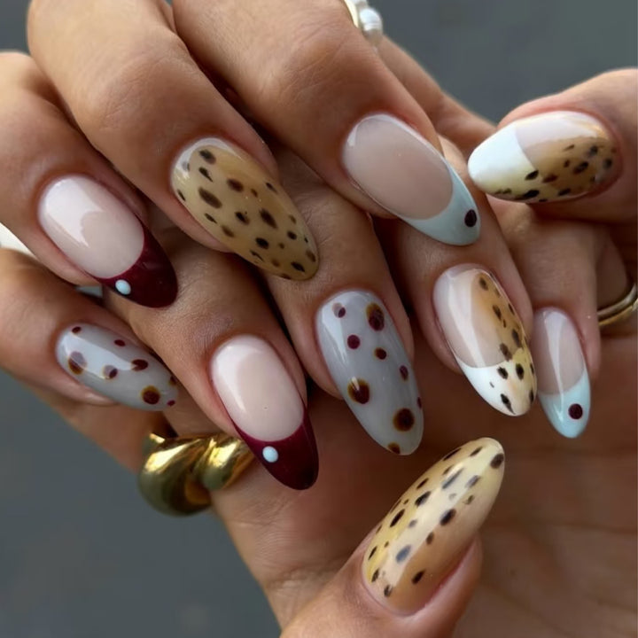 Artful stiletto nails with modern animal motif Stornfield
