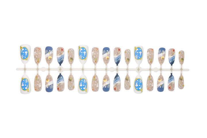 Artificial nail set with maritime designs and elegant embellishments Stornfield