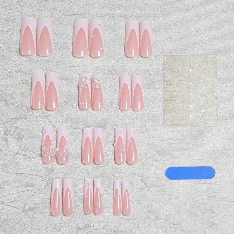 Elegant artificial nails with delicate bows and pearls Stornfield