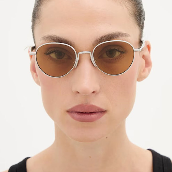 Women's round sunglasses with elegant metal frame and UV protection Stornfield