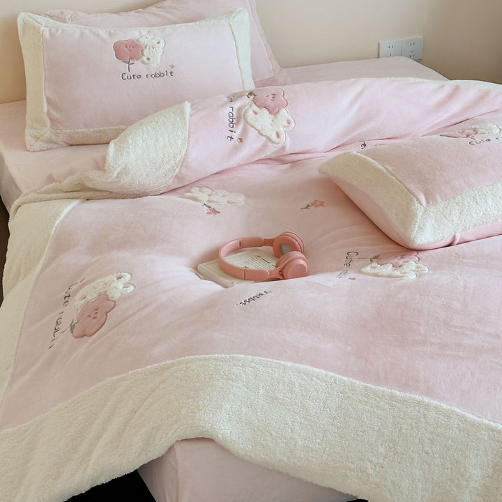 Checked bedding set with embroidered teddy bear appliqués and soft microfiber topper