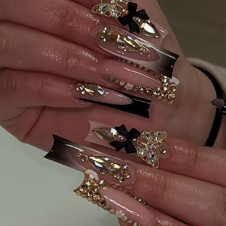 Artificial nail set with elegant 3D decorations and crystal accents Stornfield