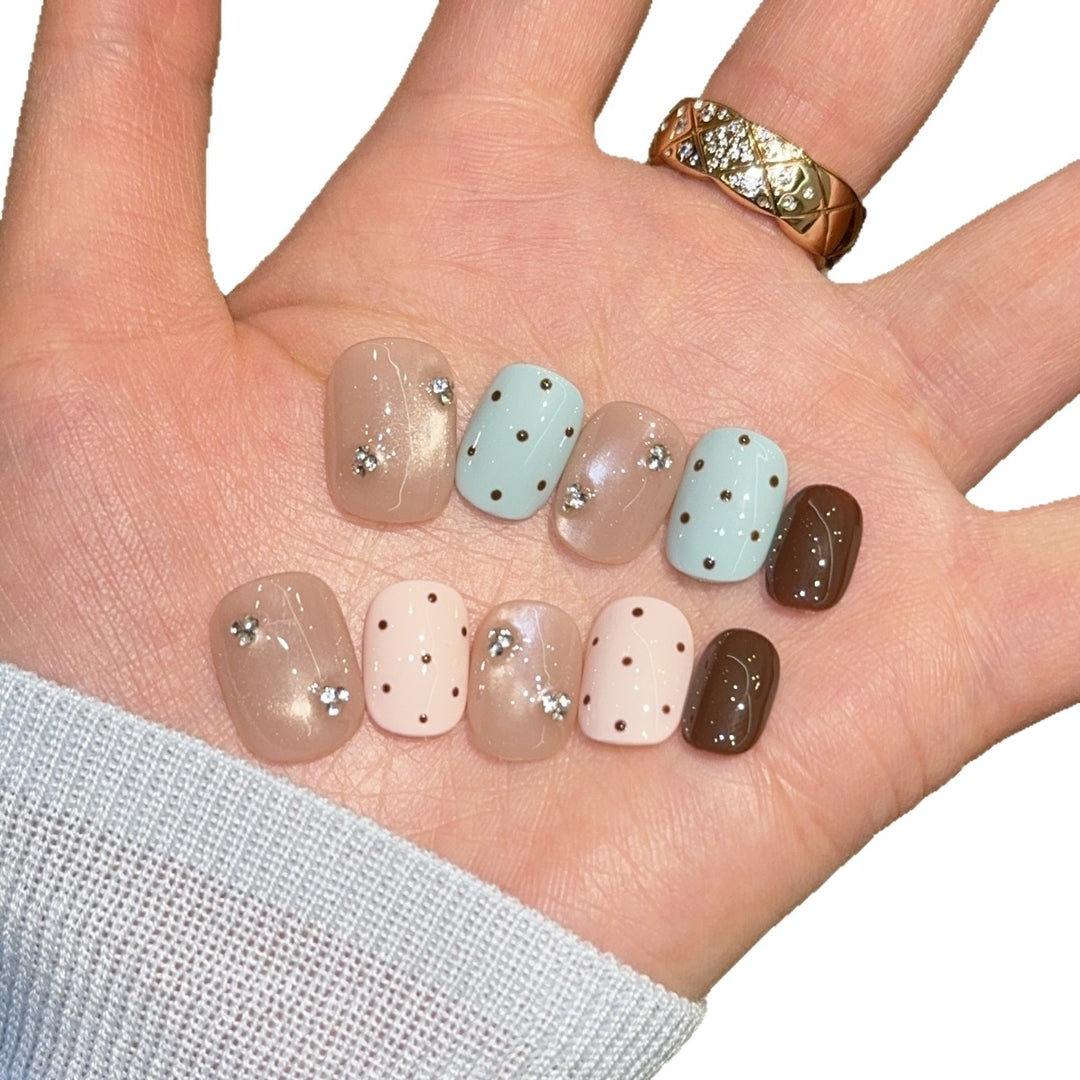 Acrylic nails with rhinestones and glitter Stornfield