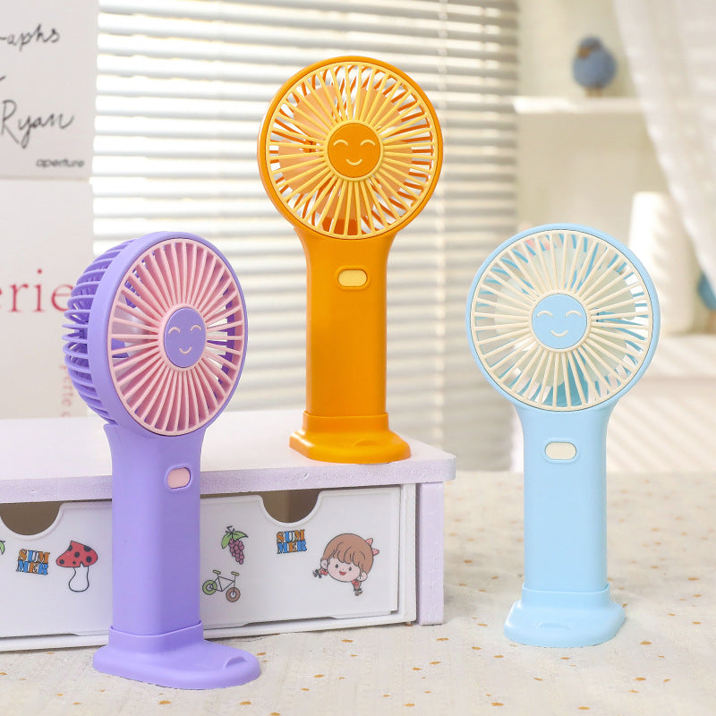 Ladies portable USB hand fan with innovative smiling design Stornfield