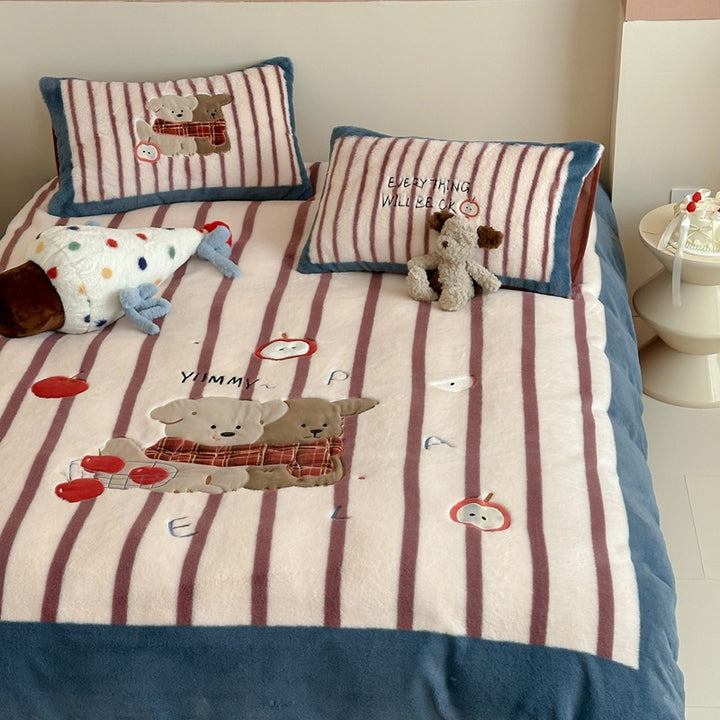 Cozy quilted bedspread with plush appliqués and matching pillowcases