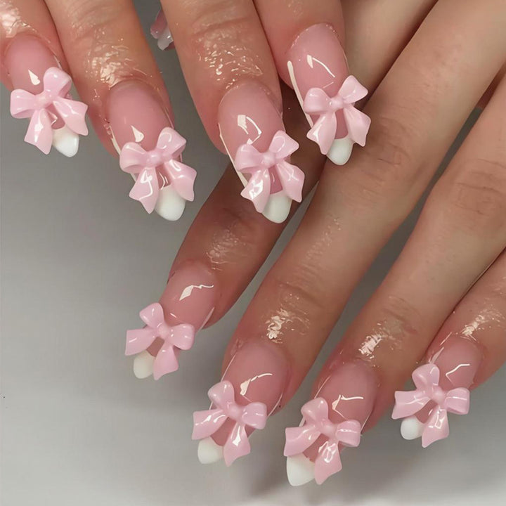 Acrylic nail set with playful bow decorations Stornfield