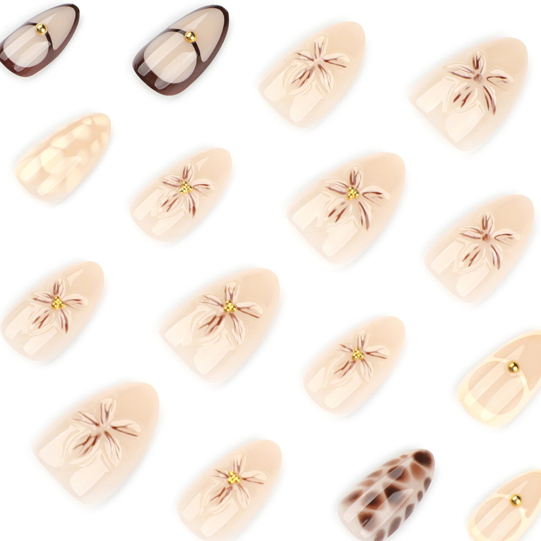 Artful Nail Extensions with Floral and Glitter Details Stornfield