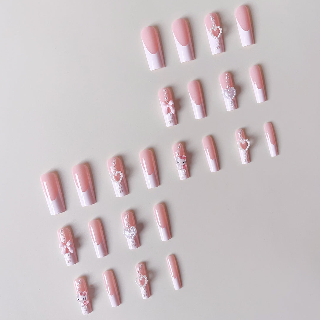 Artificial nail set with playful 3D care and pearl decorations Stornfield