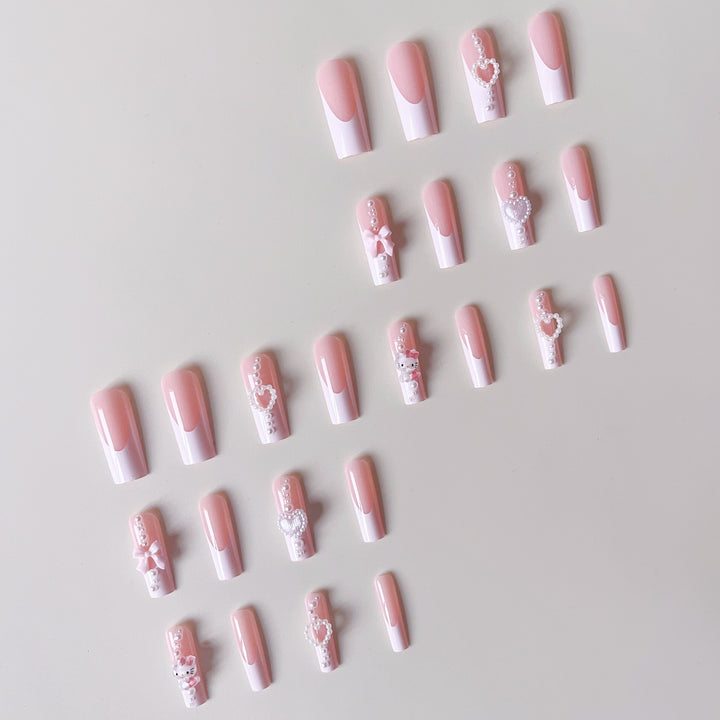 Artificial nail set with playful 3D care and pearl decorations Stornfield