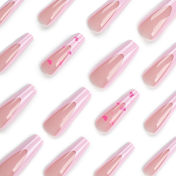 Artful Nail Extensions with Heart-Shaped Accents Stornfield