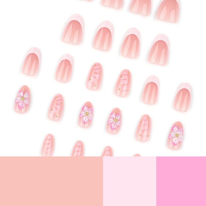 Artful Nail Extensions with Floral Design and Glitter Accents Stornfield