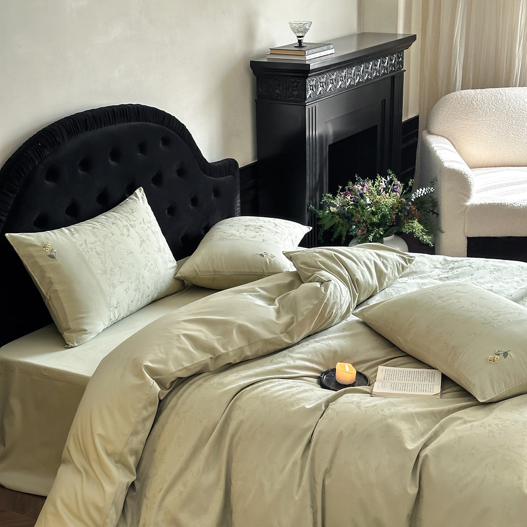 High-gloss satin bedding set with subtle floral jacquard and breathable comfort lining