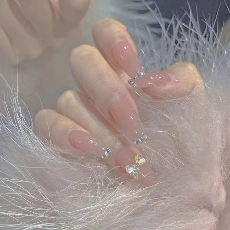 Artificial nails with elegant rhinestone embellishments Stornfield