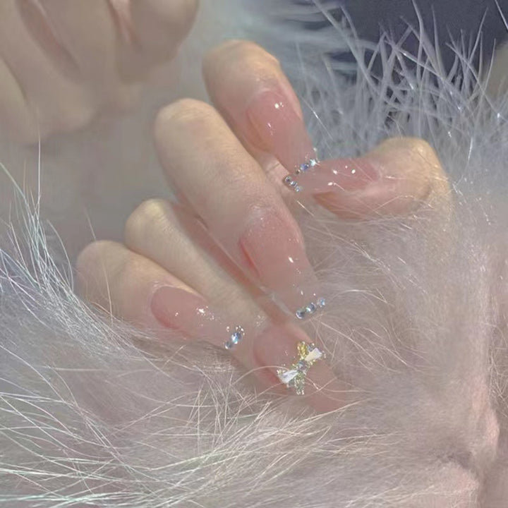 Artificial nails with elegant rhinestone embellishments Stornfield