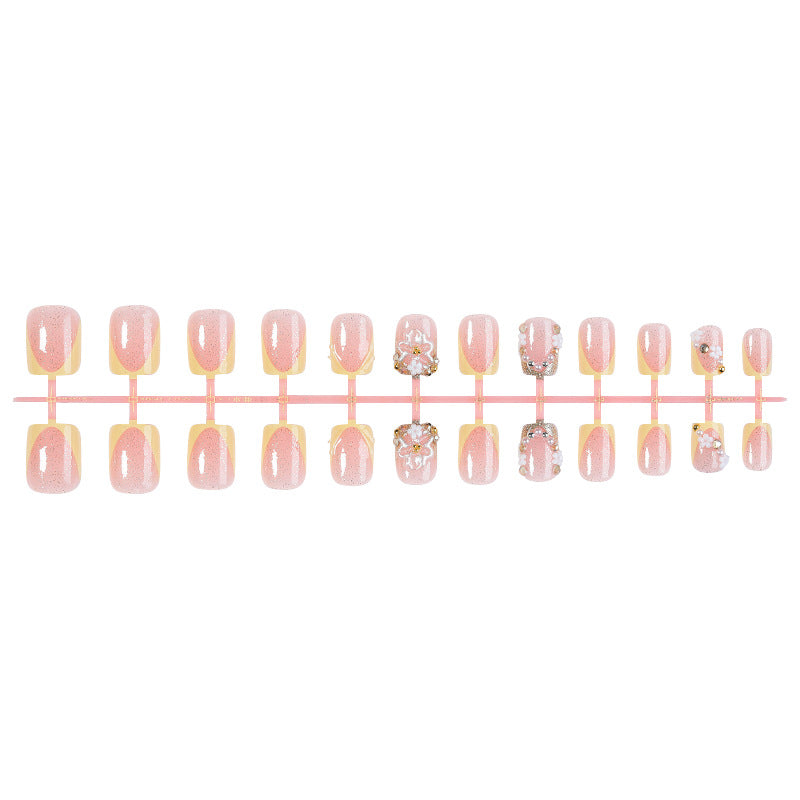 Nail art set with glamorous glitter and flower accents Stornfield