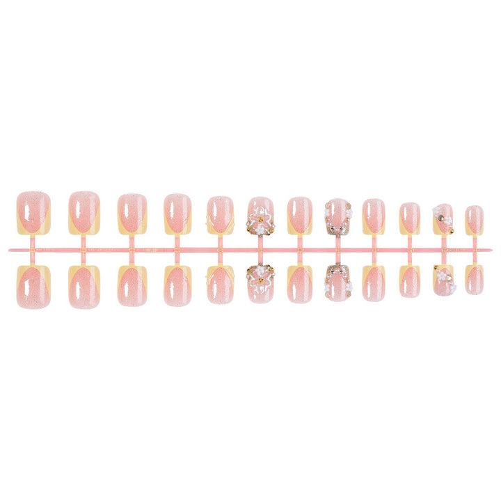 Nail art set with glamorous glitter and flower accents Stornfield