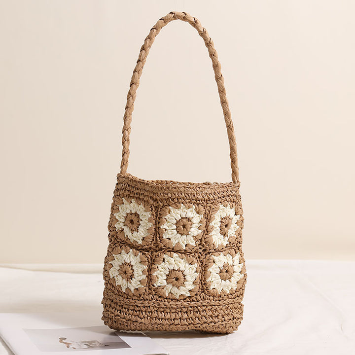 Handcrafted straw bag with floral patterns Stornfield