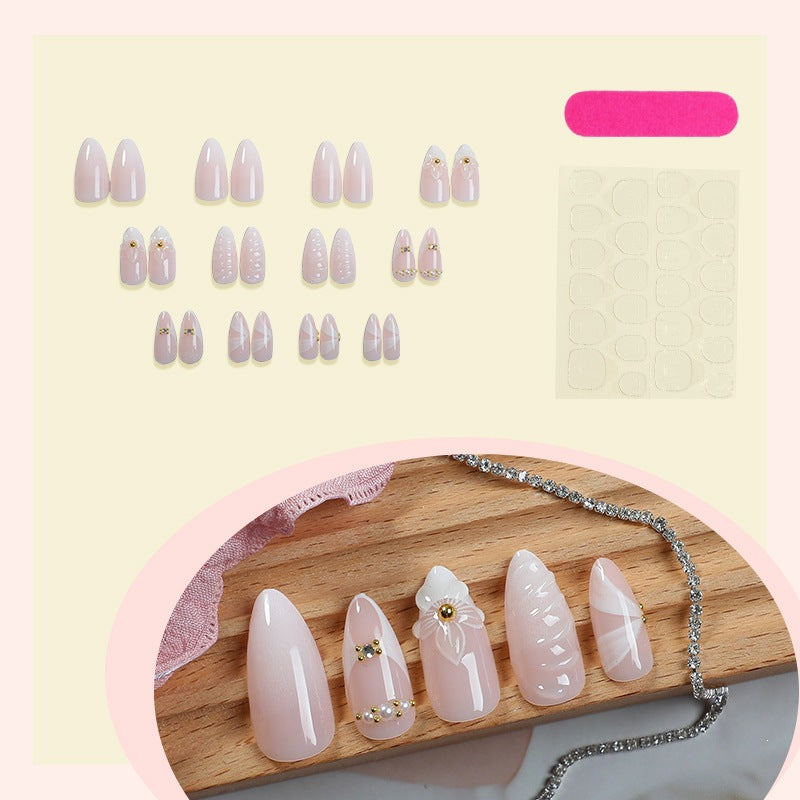 Artificial nail set with elegant floral design and luxurious accents Stornfield
