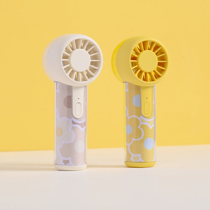 Unisex nano compact portable handheld fan rechargeable via USB with quiet operation and ergonomic grip Stornfield