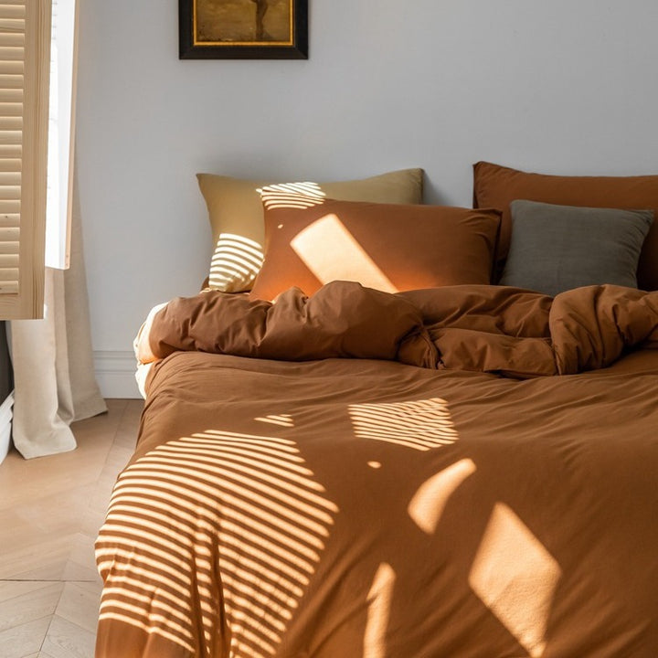 Minimalistic duvet cover set made of skin-friendly cotton blend with soft fiber filling