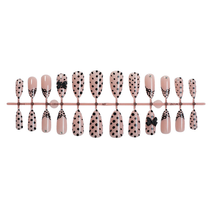 Artistic Press-On Nail Set with Polka Dot and Bow Designs Stornfield