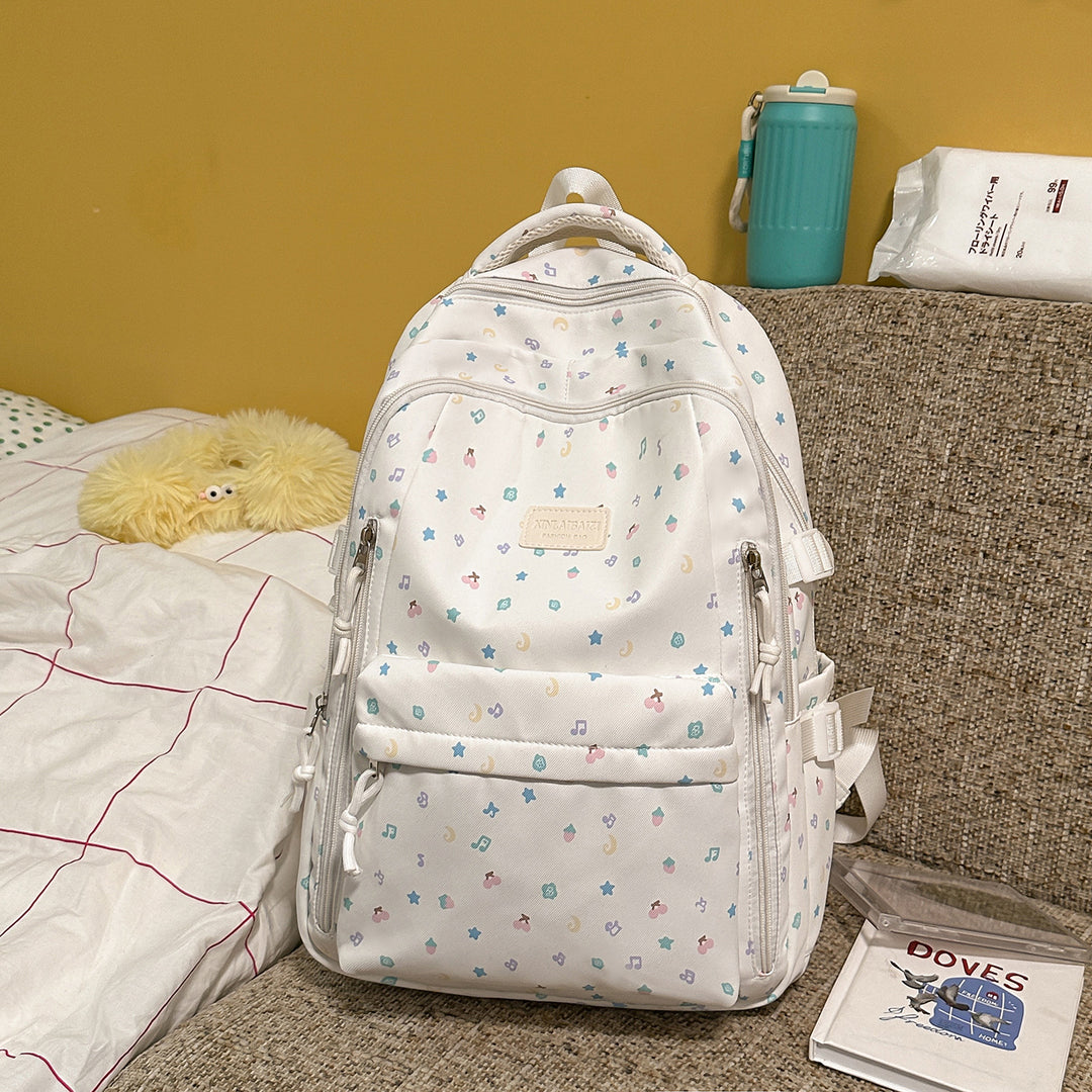 Stylish Multi-Pocket Backpack with Decorative Accents Stornfield