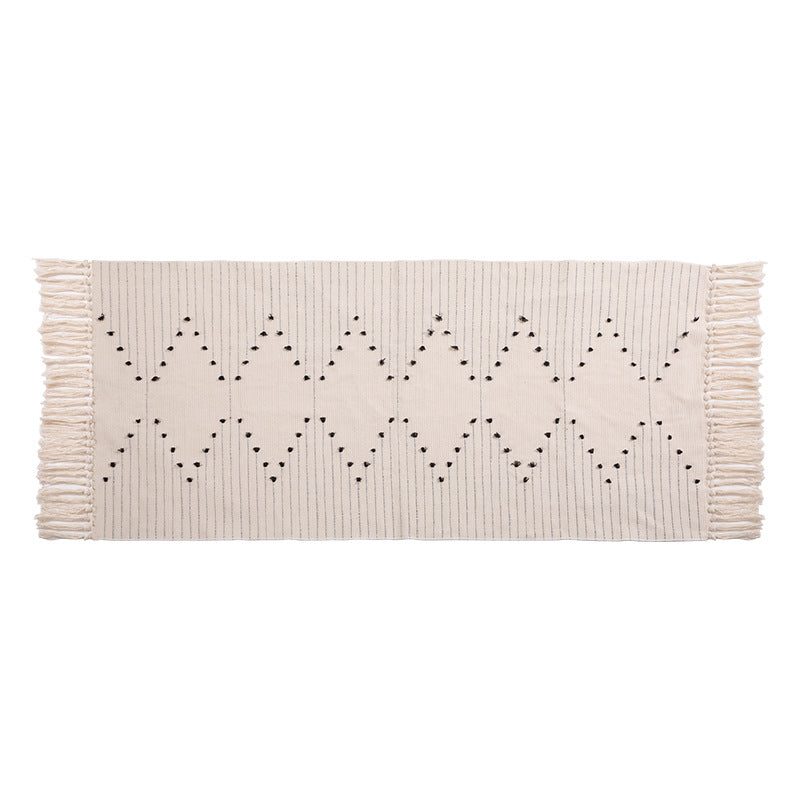 Woven runner rug with fringes and graphic polka dot pattern Stornfield