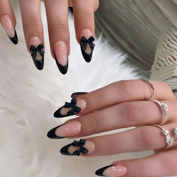 Artistic Stiletto Press-On Nail Design with Bow Accents Stornfield