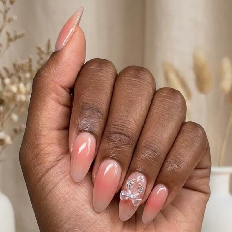Nail set with elegant ombre effects and sparkling accents Stornfield