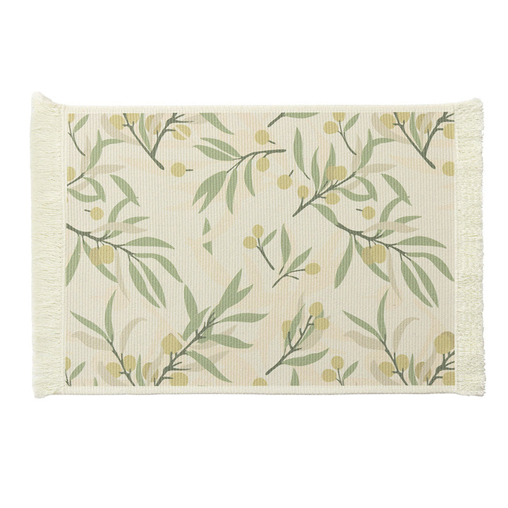 Woven table placemat made of cotton blend with olive branch print and decorative fringe edge
