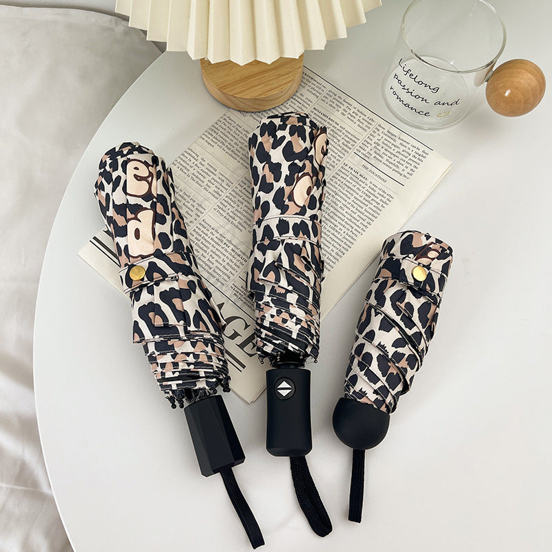 Women's Foldable Umbrella with Dynamic Leopard Pattern Stornfield