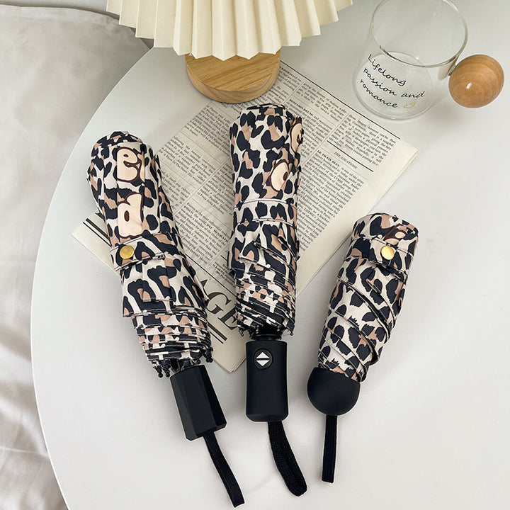 Women's Foldable Umbrella with Dynamic Leopard Pattern Stornfield