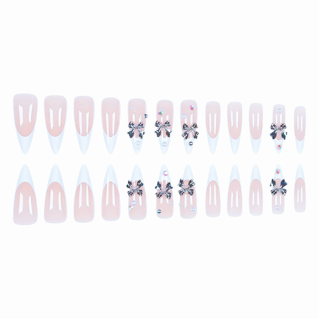 Acrylic nail set with elegant bows and sparkling accents Stornfield