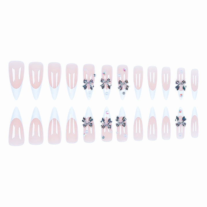 Acrylic nail set with elegant bows and sparkling accents Stornfield