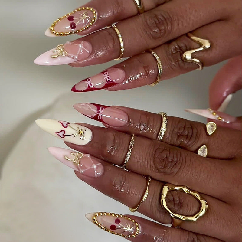 Creative nail art set with playful heart and bow accents Stornfield