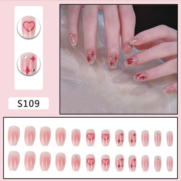 Nail art set with sparkling rhinestone details and heart motifs Stornfield