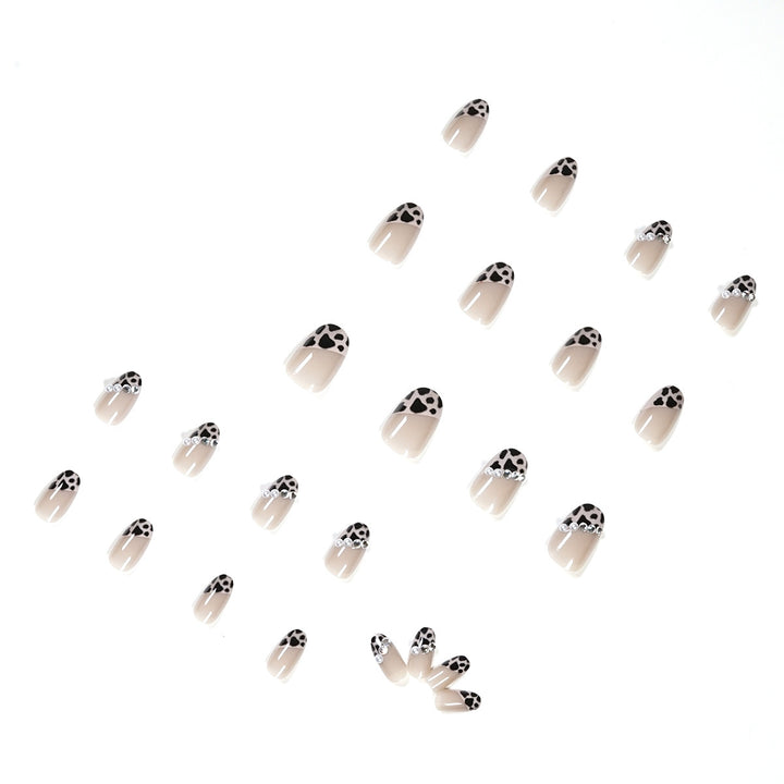 Artificial nail set with glamorous leopard pattern and elegant pearl decorations Stornfield