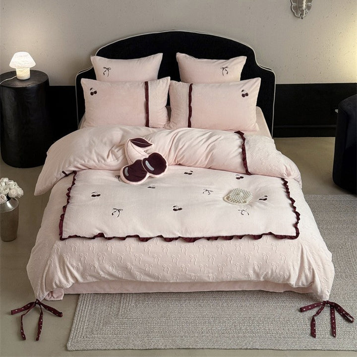 Reversible cotton satin bedding set with embroidered cherry, delicate frill and decorative bows Stornfield