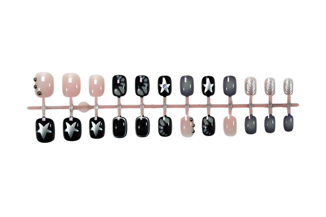 Artificial nail set with creative star and glitter designs Stornfield
