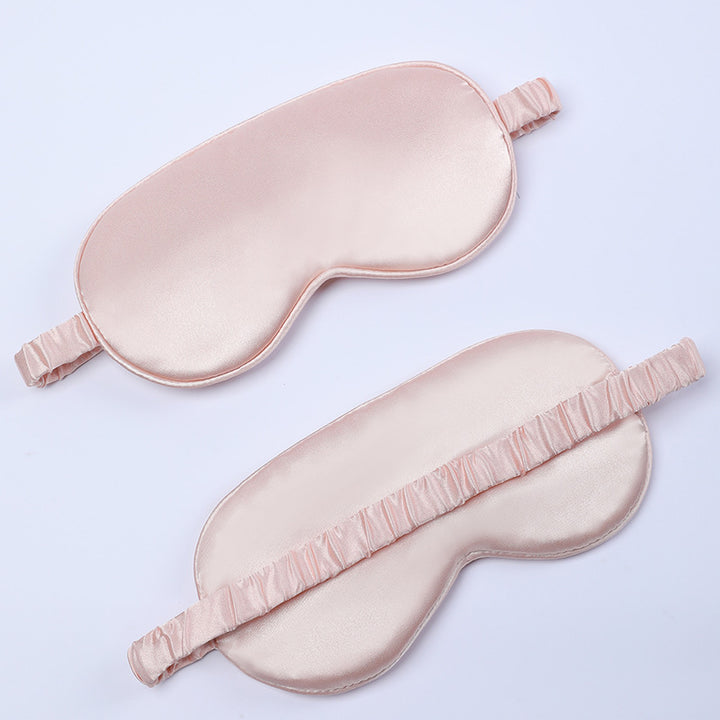 Women's nano silk sleep mask with padded eye area, adjustable elastic band, and storage pouch Stornfield