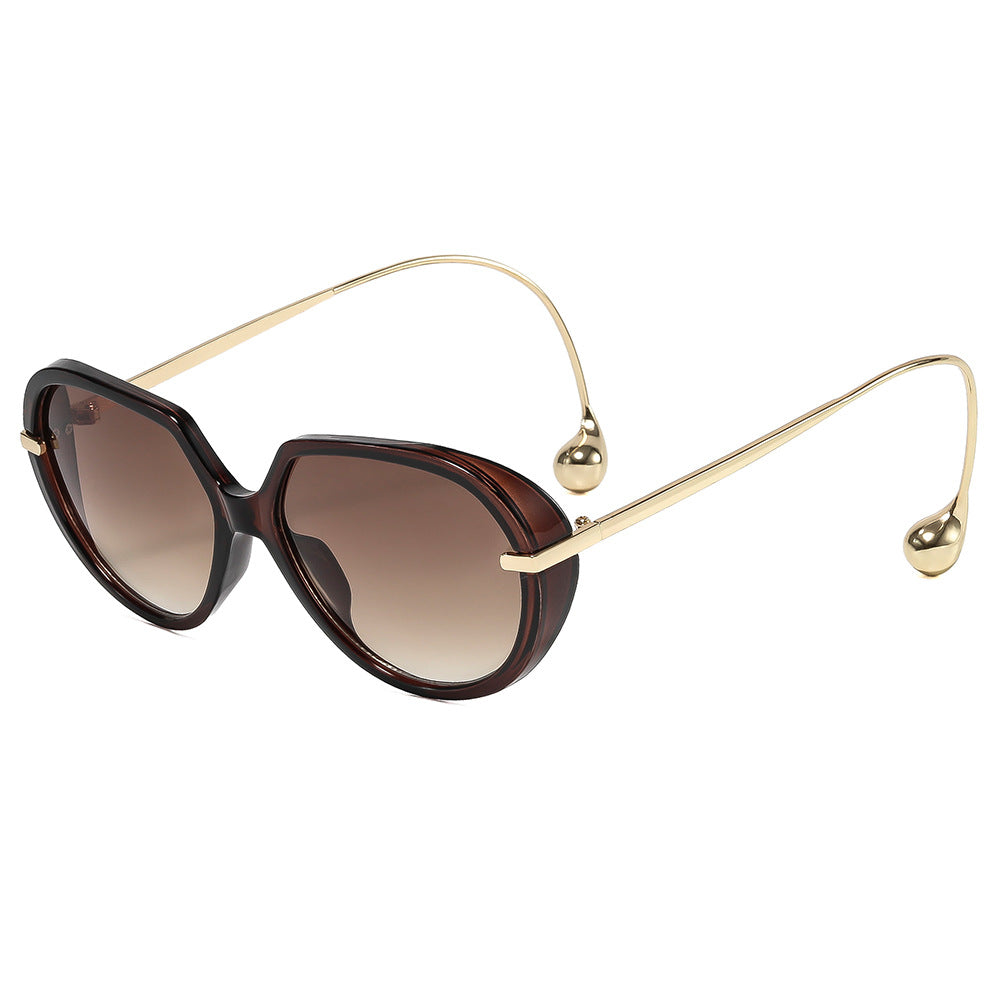 Women's Cat-Eye Sunglasses with Golden Accents and Stylish Frame Stornfield