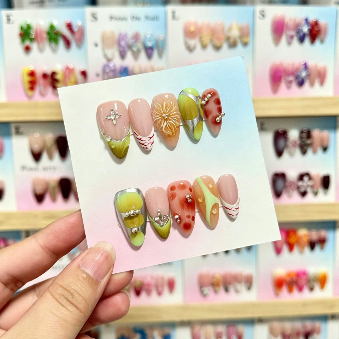Artistic Press-On Nail Set with Decorative Floral and Gem Accents