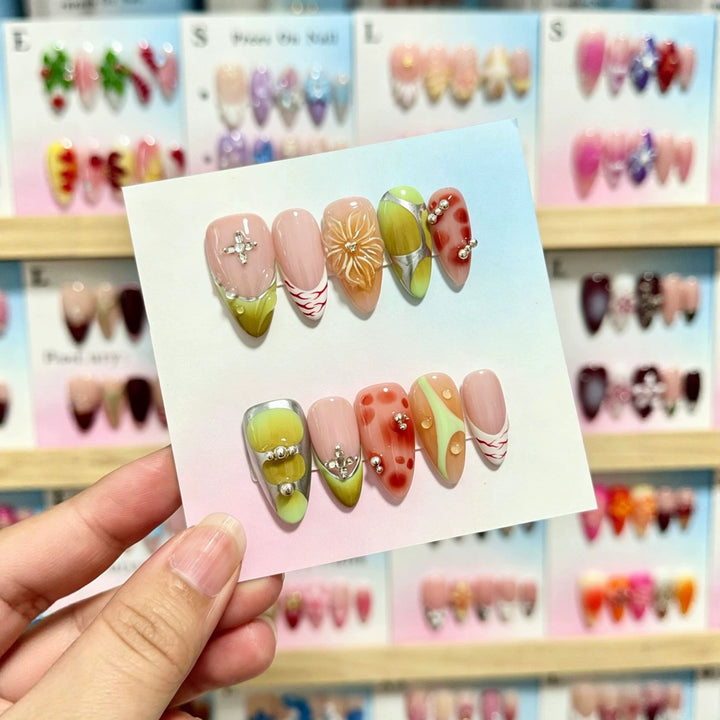 Artistic Press-On Nail Set with Decorative Floral and Gem Accents