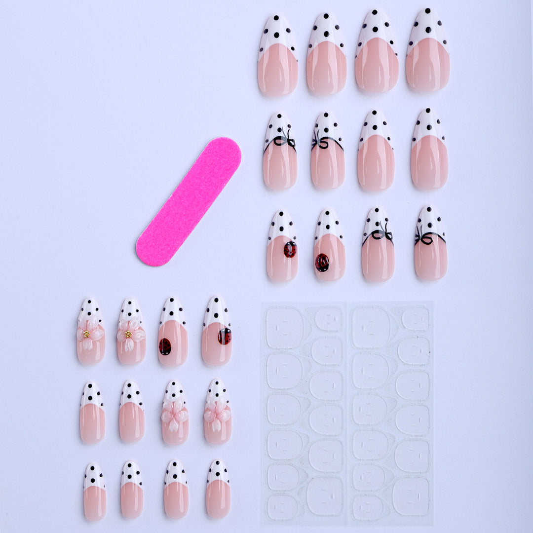 Artificial nail art with floral and playful accents Stornfield