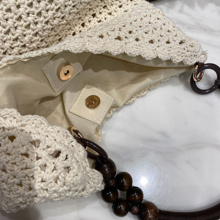 Hand-knotted bucket bag with wooden handles Stornfield